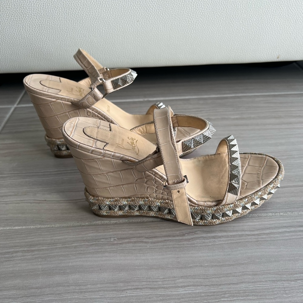 Christain Louboutin worn a few times.  100% Authentic.